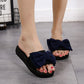Bow Tie Wedge Flip-Flops